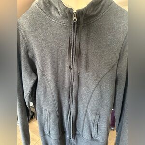 Women’s champion brand zip up hoodie. Size large.